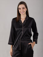 Premium night suit in fluid matte satin for women. Piping color is dusty rose. Minimal button gaps and quarter sleeves