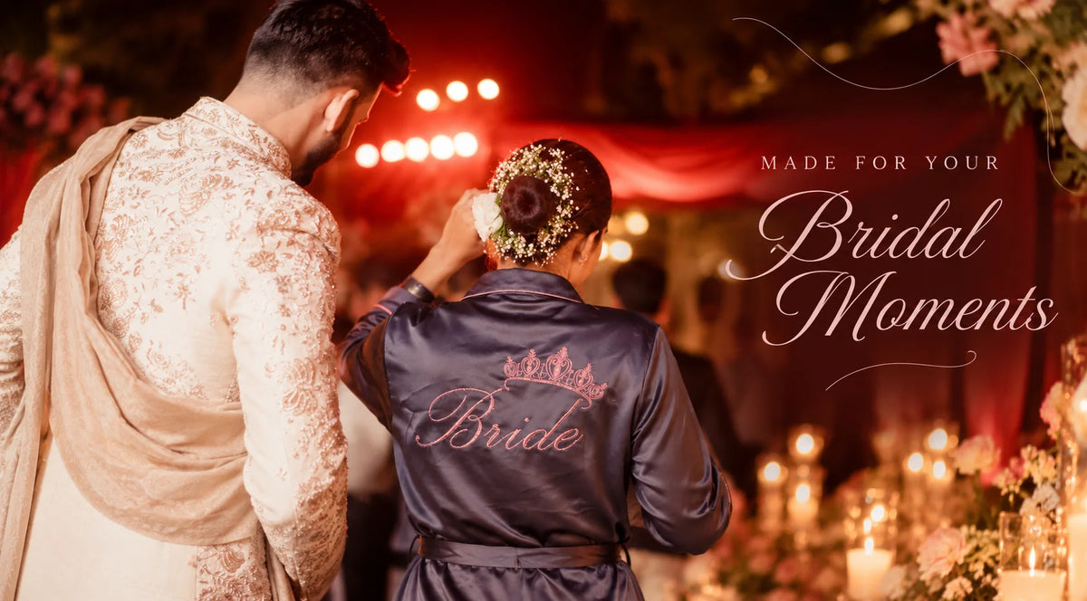 This image banner showcases bridal moment where a bride wears a bridal robe in her wedding with her groom.