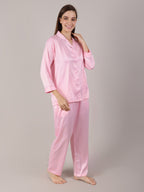 Woman wearing Baby Pink satin nightwear