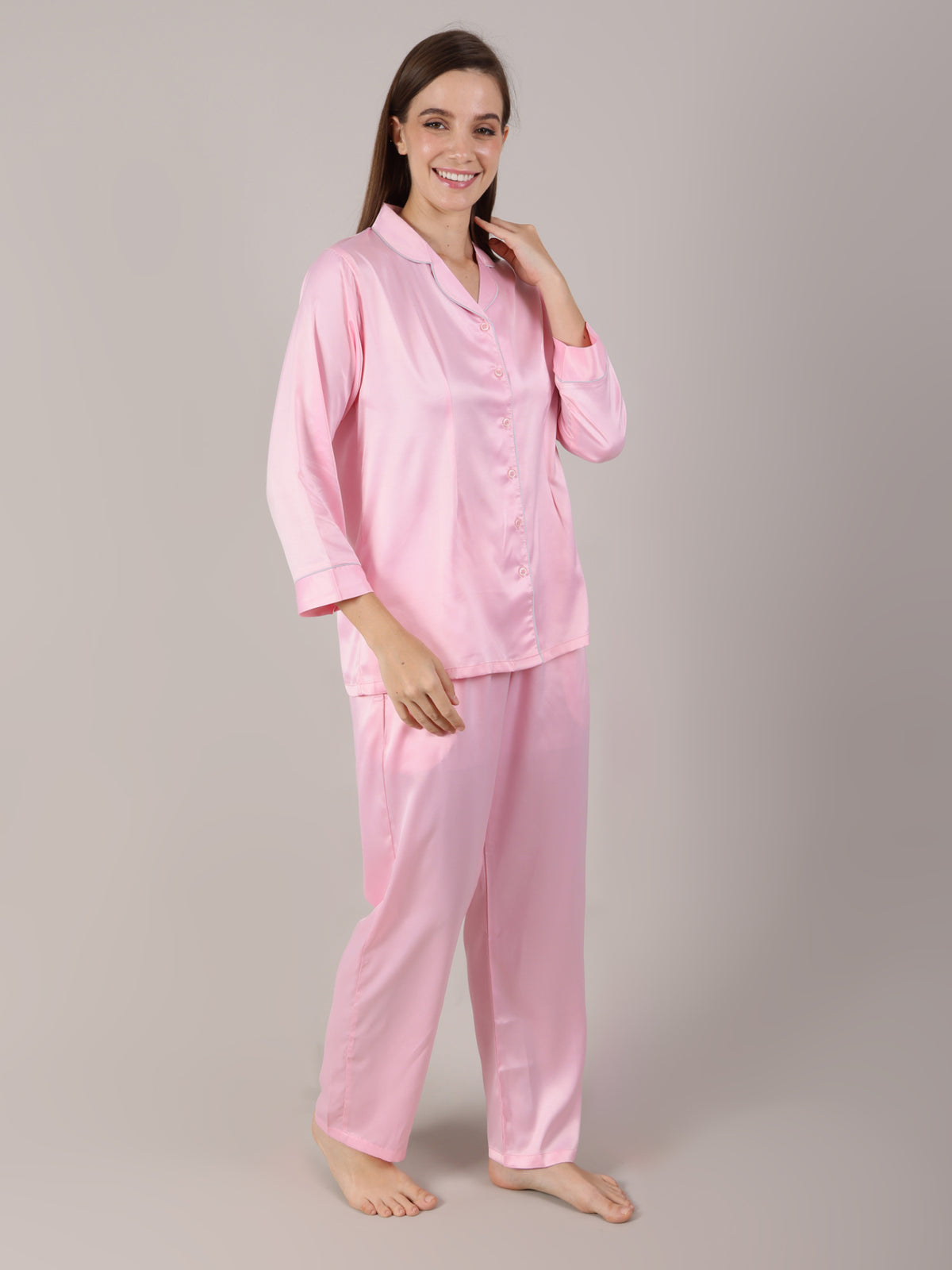 Woman wearing Baby Pink satin nightwear
