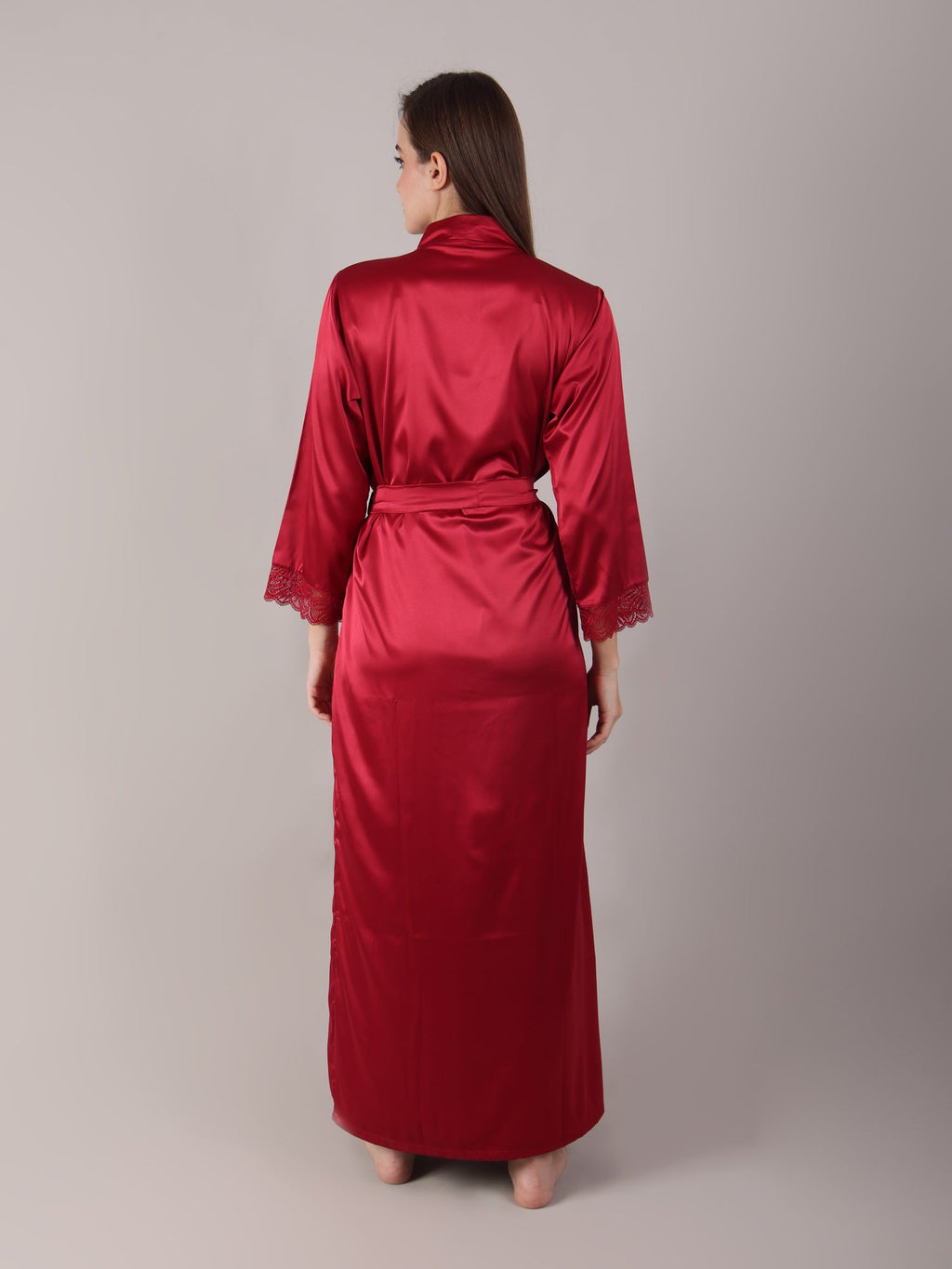 Red satin robe worn by a person on a plain background for more coverage and comfort.